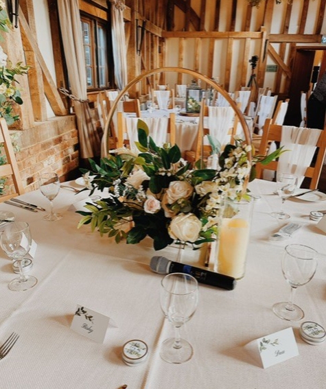 gold hoop with flowers on table