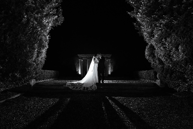 wedding couple at dusk in black and white image