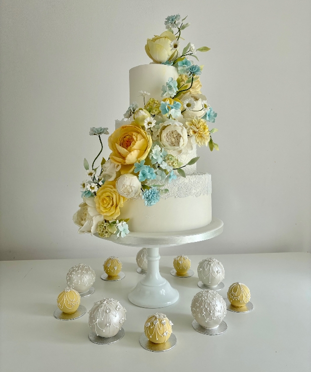 blue white and yellow display of cakes