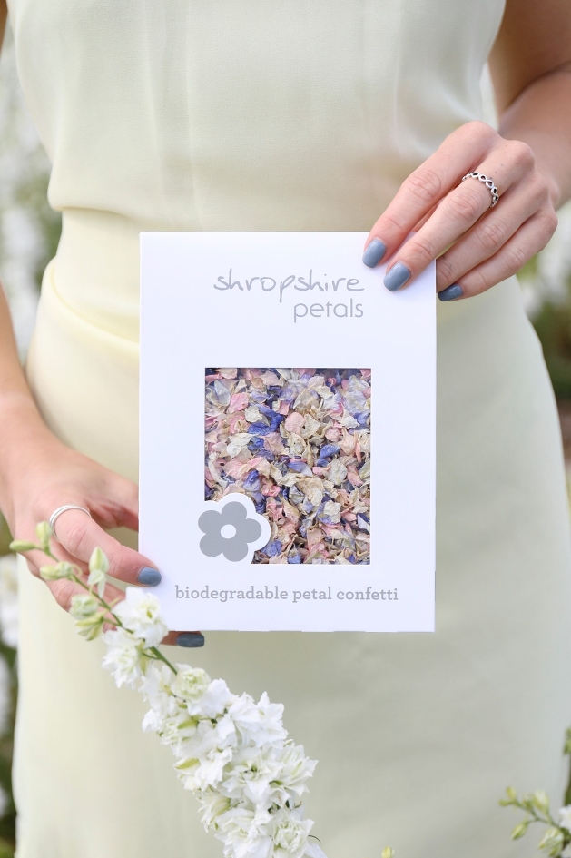 bride holding confetti bag 