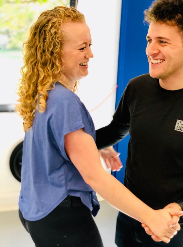 couple practising a dance routine