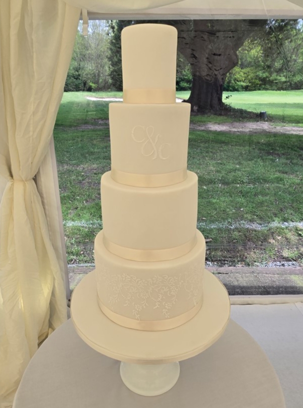 four tier white cake design 